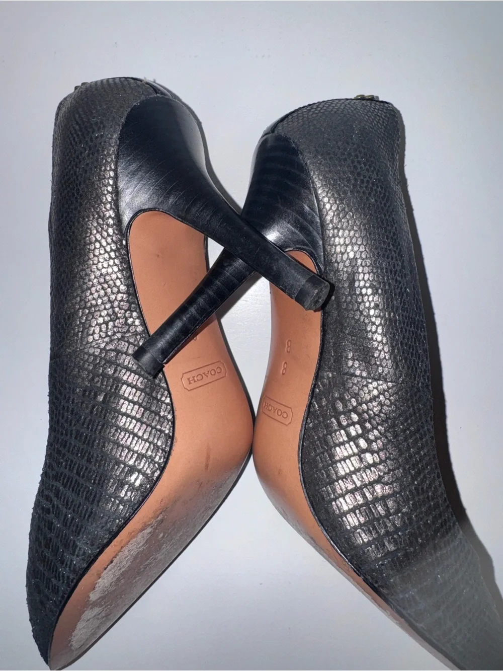 Coach black metallic